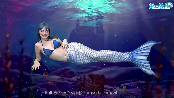 Mermaid indulges in solo play until reaching peak arousal