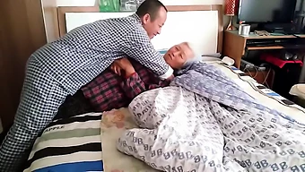 Elderly Asian Lady And Her Younger Partner In A Homemade Video