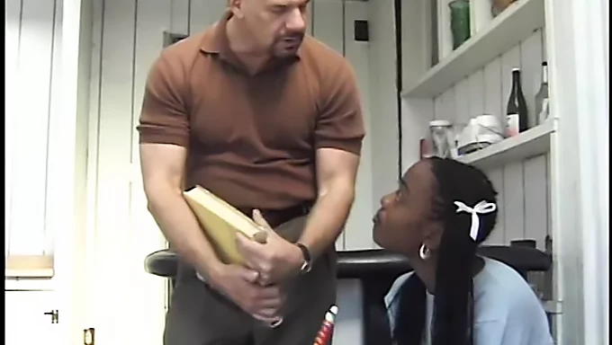 A black high school student enjoys giving oral pleasure to a white penis, with a focus on face fucking and anal play