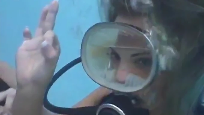 Scuba diving babe gets covered in cum